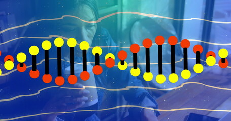 Freelancer in denim jacket holding coffee cup, working on laptop at coffee shop, with DNA helix