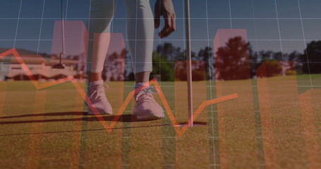 Mature female golfer positioning putter behind golf ball in putting green, with data overlay