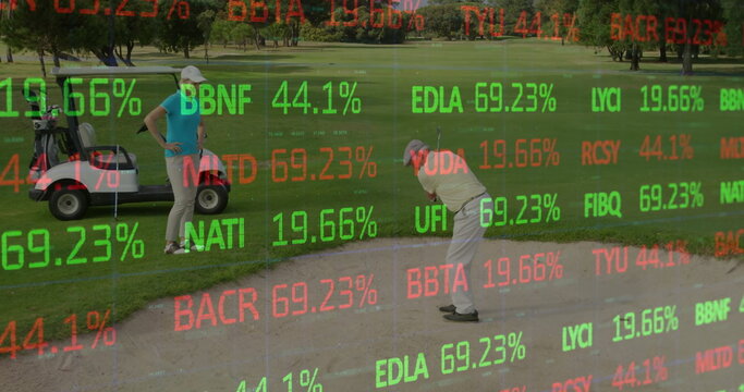 Swinging golfer hitting golf ball from bunker on golf course, with stock ticker overlay