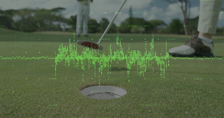 Hovering golf putter head above cup on putting green at golf course, with data overlay graphics © vectorfusionart