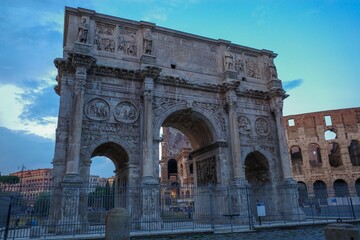 Arch of Constantine with Colosseum in Rome.