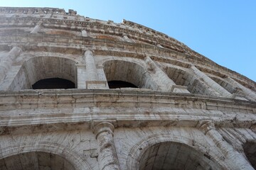 Colosseum close-up against blue sky