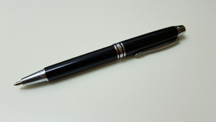 Elegant Black and Silver Pen on a Clean White Surface for Business and Writing Concepts Promoting Professionalism and Precision Tool with Refined Design
