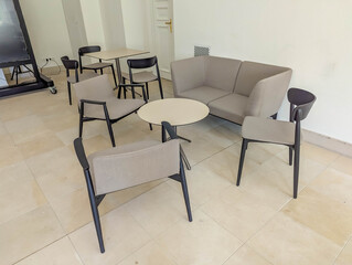 Executive meeting room with contemporary furniture design featuring modern chairs and natural daylight illumination