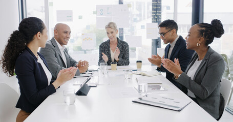 Applause, success and planning with business people in meeting for profit report, teamwork and pitch. Celebration, account growth and partnership with employees in office for investment portfolio