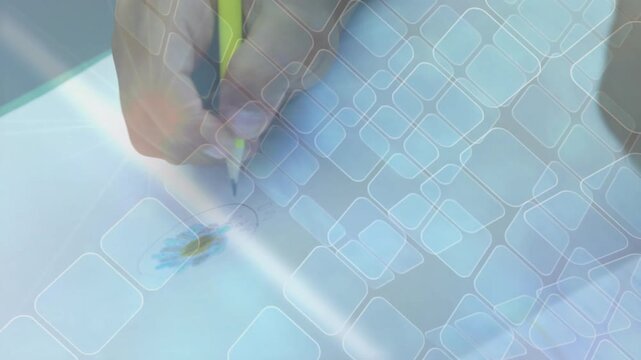 Hand entering frame sketching flower outline, coloring petals, shading center under grid