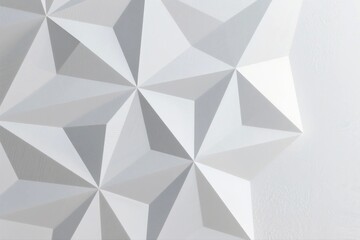 A modern geometric abstract wall design featuring white polygonal shapes creating a 3D pattern with light and shadow effects.