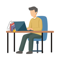 Man working on laptop at desk with books