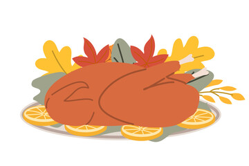 Thanksgiving roasted turkey on platter with autumn leaves and orange slices.