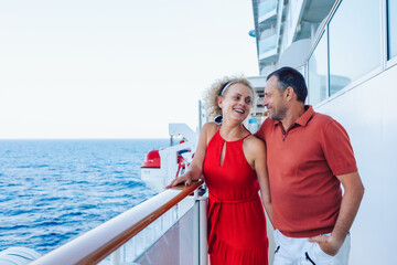 Married couple on cruise ship. Attractive couple on deck with cruise ship. High quality photo