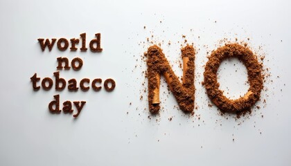 World No Tobacco Day message created with broken cigarettes and scattered tobacco crumbs on white background. The concept emphasizes smoking rejection, health awareness, and addiction prevention.