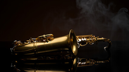 Naklejka premium A vintage golden saxophone lies on a reflective black surface with soft smoke or steam gently rising from its bell creating a moody and atmospheric musical scene