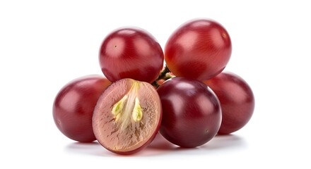 Fresh red grapes with one grape cut in half showing seeds