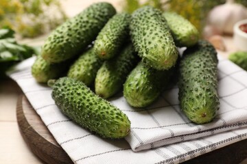 Making pickles. Fresh cucumbers on light table, closeup