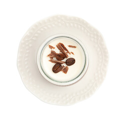 Delicious panna cotta with chocolate chunks and coffee beans in jar isolated on white, top view