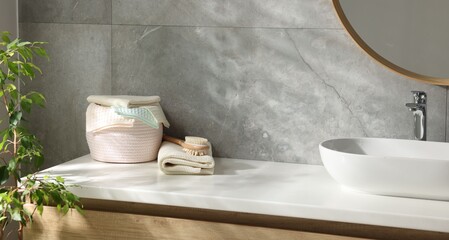 Clean waffle towels and brush near sink in bathroom