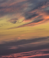 Fototapeta premium Glowing clouds in a radiant sunset sky