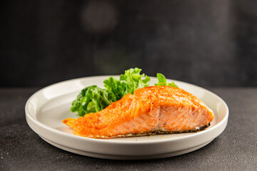 salmon fried fish seafood second course tasty snack fresh delicious gourmet food background on the table rustic food top view copy space pescetarian diet