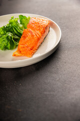 salmon fried fish seafood second course tasty snack fresh delicious gourmet food background on the table rustic food top view copy space pescetarian diet