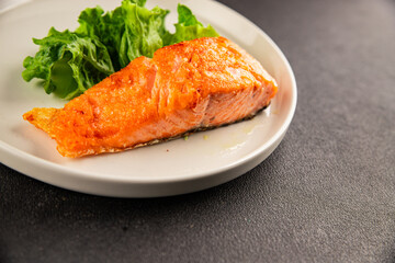 salmon fried fish seafood second course tasty snack fresh delicious gourmet food background on the table rustic food top view copy space pescetarian diet
