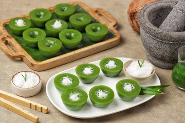 Kue Lumpang. Lumpang cake is a popular wet cake with a unique shape, namely dimpled.