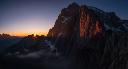 Majestic Mountain Sunset: Dramatic Landscape with Golden Light.