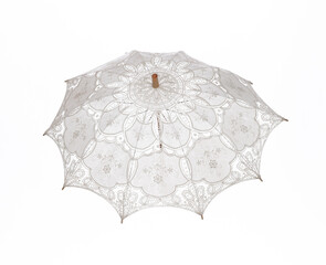 white vintage fabric umbrella isolated on white background