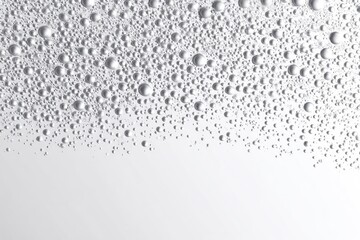 Obraz premium Close-up of numerous small, spherical water droplets