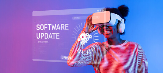 A joyful woman engages with virtual reality technology while wearing a VR headset. The vibrant...