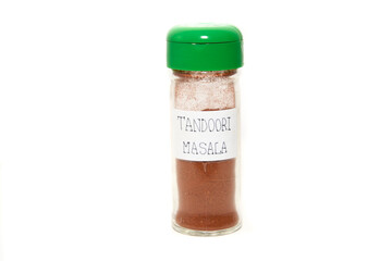 spice jar over white background. Tandori masala