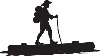 Silhouette of a hiker with a backpack and hat walking on a log with a walking stick for support