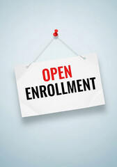 Photo of open enrollment sign hanging on a wall promoting the benefits and insurance enrollment period