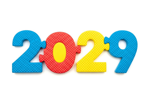 Photo of the year 2029 is depicted with colorful foam puzzle pieces against a white background indicating a future date