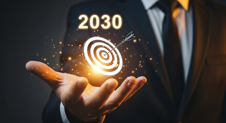 Photo of businessman holding a target with the year 2030 symbolizing future goals and strategic planning for business success