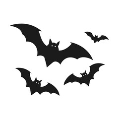 Silhouette of four black bats flying against a white background