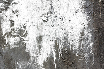 Obraz premium Rough Grey Concrete Wall Texture with Torn Edge, Weathered and Distressed Cement Surface, Perfect for Backgrounds, Overlays, and Industrial Design Projects.