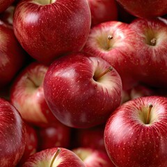 Close-up view of a pile of smooth, shiny red apples highlighting their freshness and rich color, ideal for healthy snacking or cooking SEAMLESS PATTERN