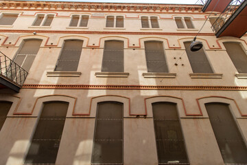 Facade of an old textile factory, now museum, in Mataro, Barcelona, Catalonia, Spain, Europe