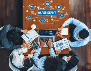 A diverse group of professionals collaborates on AI assistant solutions while analyzing data and discussing strategies at a modern office table, showcasing teamwork and innovation. Amity