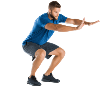 A man demonstrates the correct form while performing a bodyweight squat for fitness.