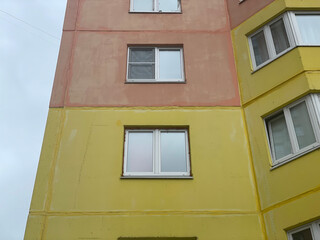 White window on the wall of the house