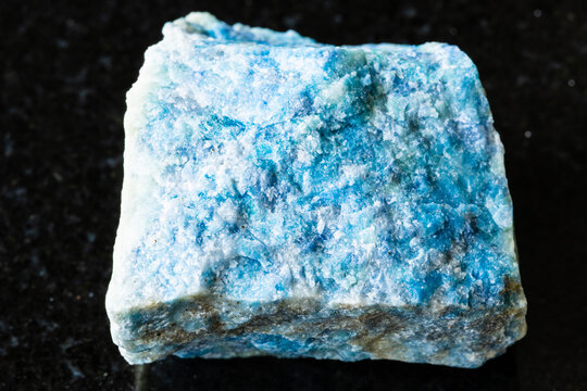 sample of rough lazurite rock on black