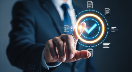 Photo of businessman using digital interface to confirm successful completion of a task and ensure quality control