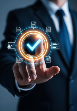 Photo of businessman using a digital interface to confirm the quality control standards and regulatory compliance of a company