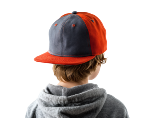 A young person wearing a baseball cap, seen from behind, in a studio shot.