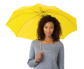 A stylish woman poses with a bright yellow umbrella. She looks happy and radiant.