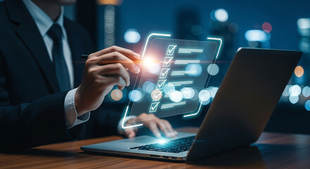 Photo of businessman using a digital contract on a futuristic interface with a laptop in a modern office environment
