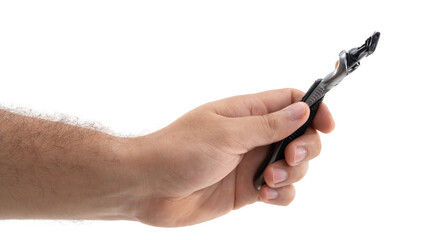 Hand holding a razor tool for shaving and grooming in a clean and minimalistic setting