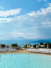 Swimming pool with lake and mountain views