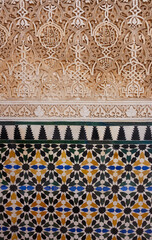 Arabic tiles on the walls of the Nasrid Palace at the Alhambra in Spain